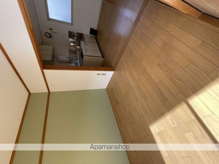 メゾンヨシダA102の居間