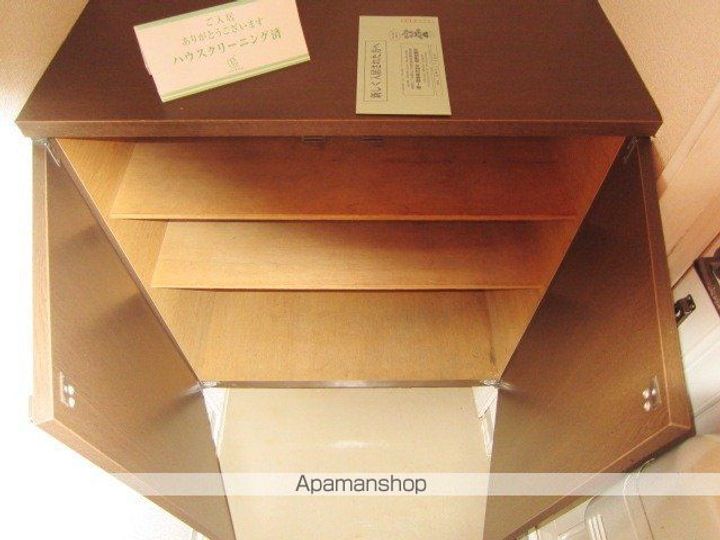 グリーンタウン三輪A棟201の玄関