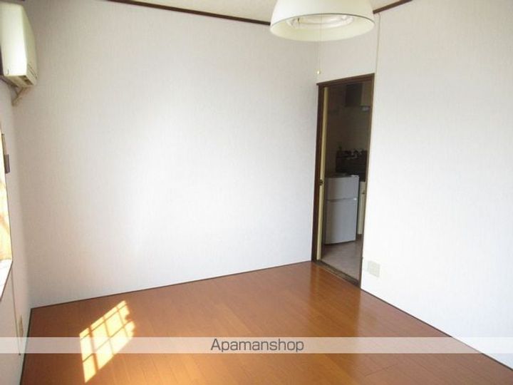 岩手県盛岡市高松1丁目の賃貸アパートCの居間