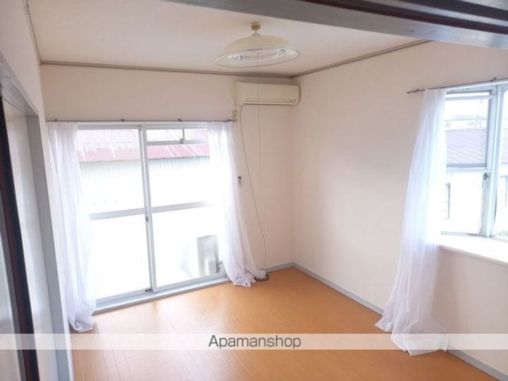 ブルーミング岩沼201の居間