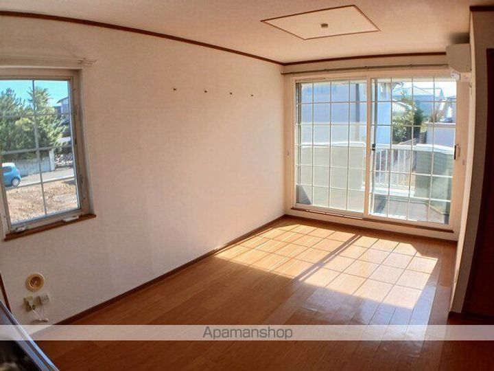 宮城県名取市名取が丘2丁目の賃貸アパートの居間