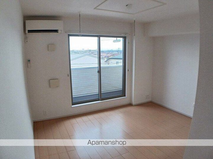 宮城県仙台市太白区袋原3丁目の賃貸アパート203の居間