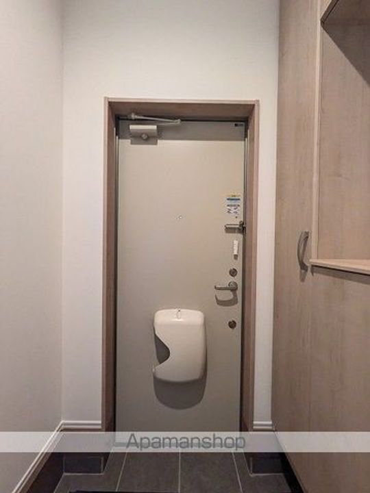 ブリス丸子新田102の玄関