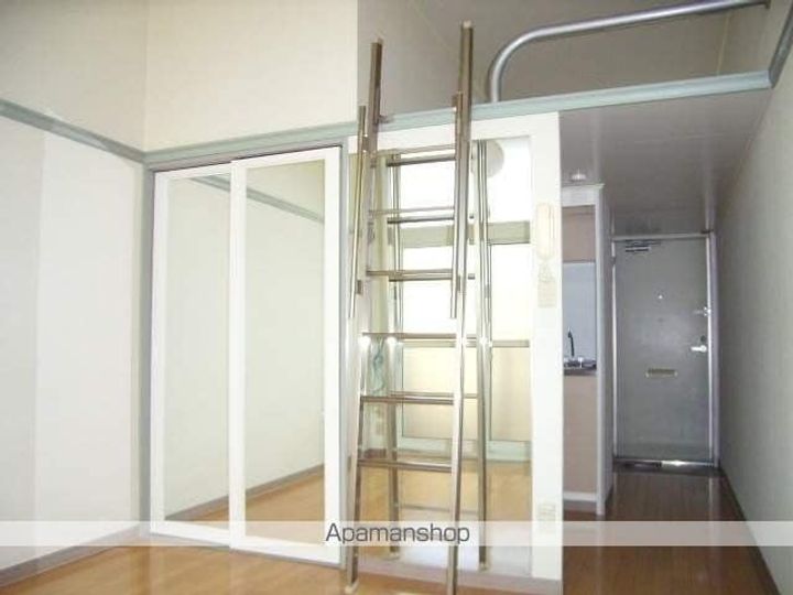 ロイヤル岩切102の居間