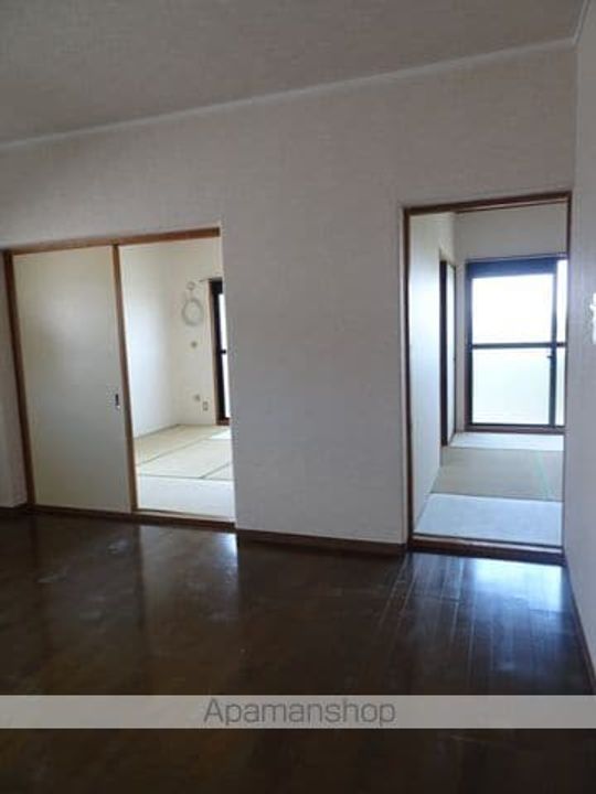 共立マンション小松里407の居間