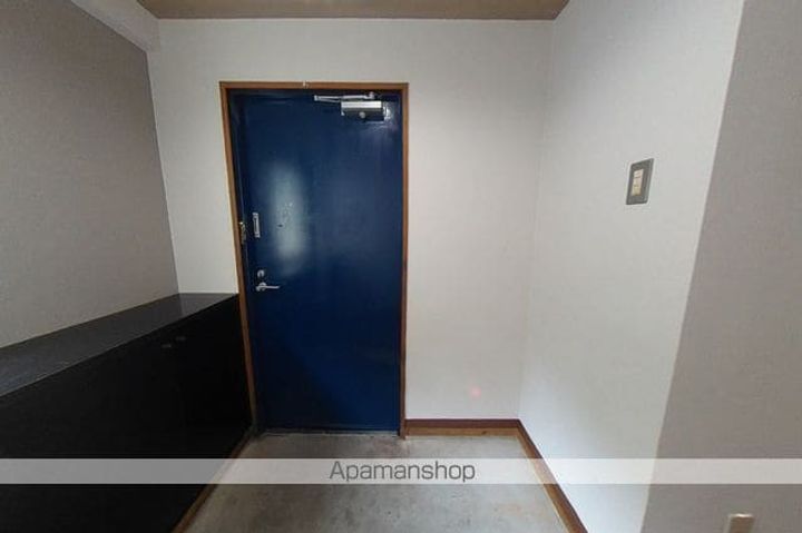 ヒルサイド小高坂の玄関