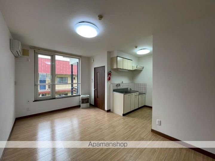 エスレイア西16条202の居間