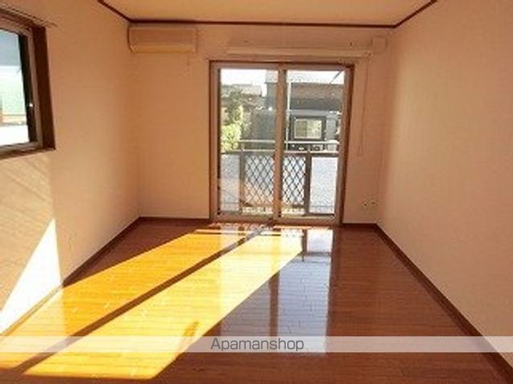 岩手県盛岡市厨川4丁目の賃貸アパートの居間