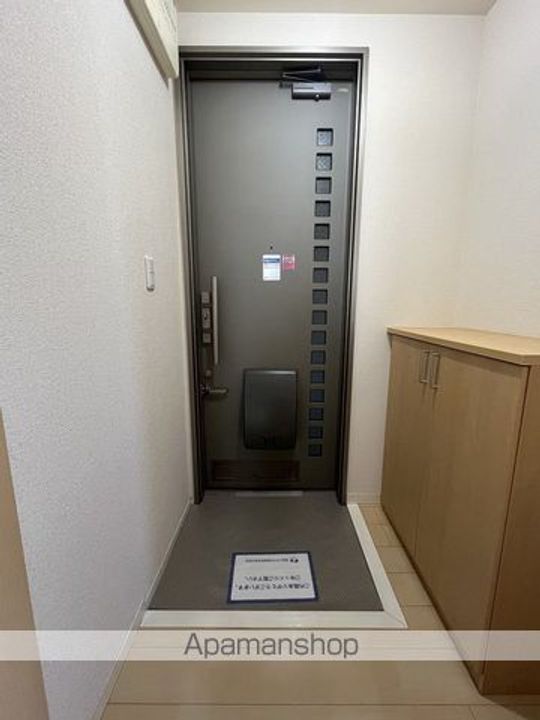 メゾンカルム308の玄関