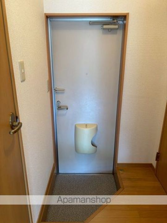 サンリバー大石102の玄関