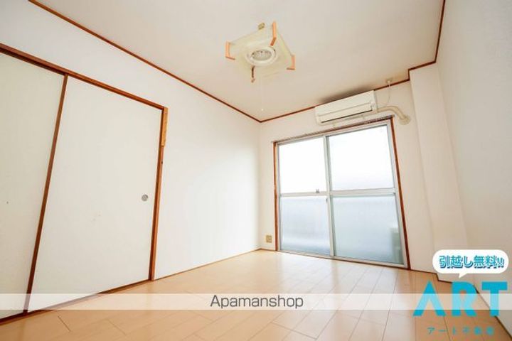 愛媛県松山市土居田町の賃貸マンション305の居間