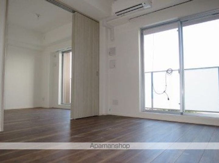 東京都中野区白鷺1丁目の賃貸マンションの居間