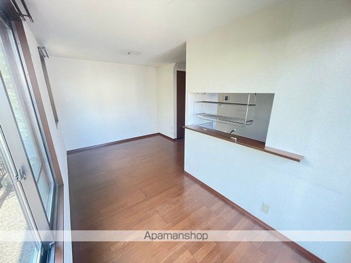 埼玉県久喜市南栗橋4丁目の賃貸アパート101の居間