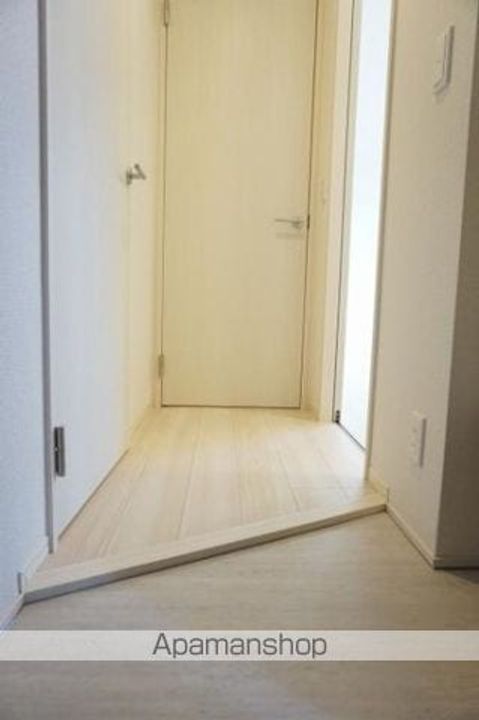 アーブルヴィラージュA棟の玄関