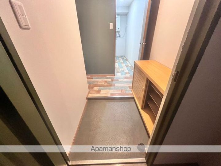 ピアコート21209の玄関