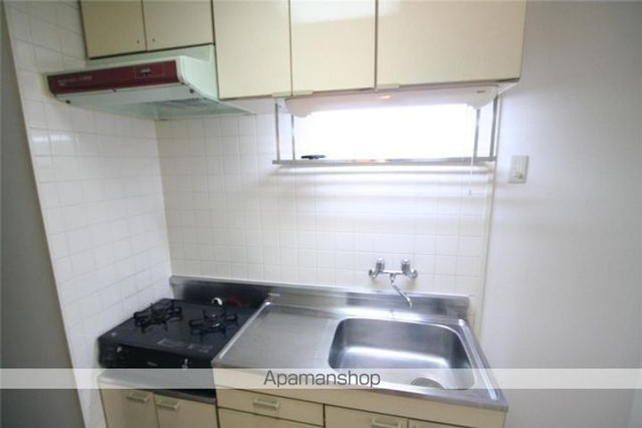 愛媛県松山市道後今市の賃貸マンション201のキッチン