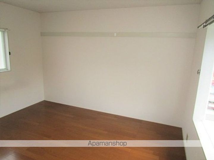 イヴォワール青葉201の居間