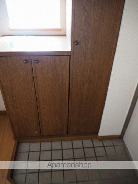 サンスカイ草葉A201の玄関