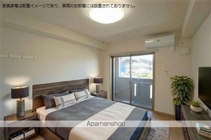 タウンヒルズ草薙201の居間