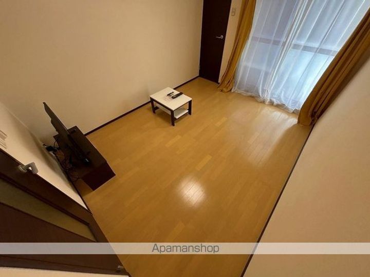 東京都中野区上鷺宮3丁目の賃貸アパート105の居間