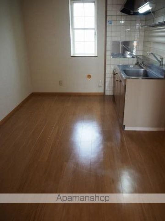 サンスカイ草葉A201の居間