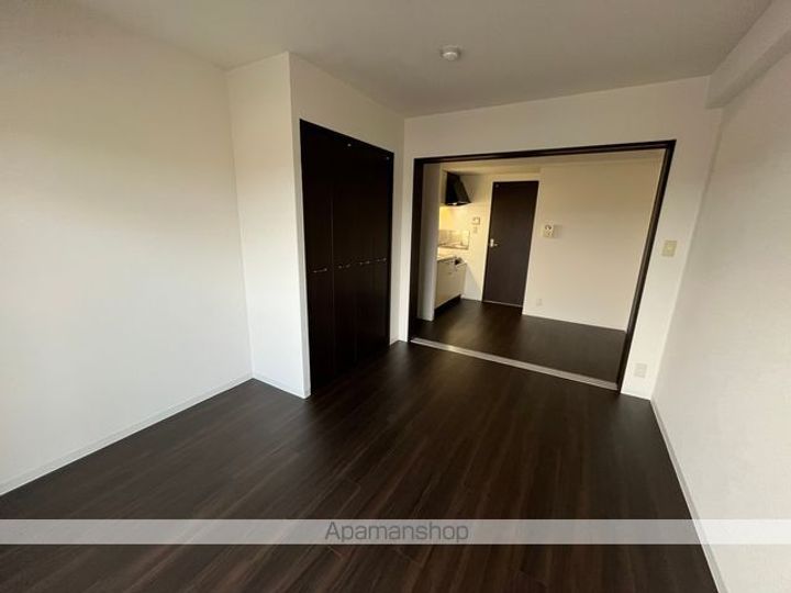 滋賀県草津市野路4丁目の賃貸マンション707の居間