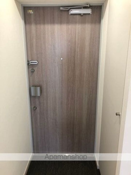 レオーネ志村坂上の玄関