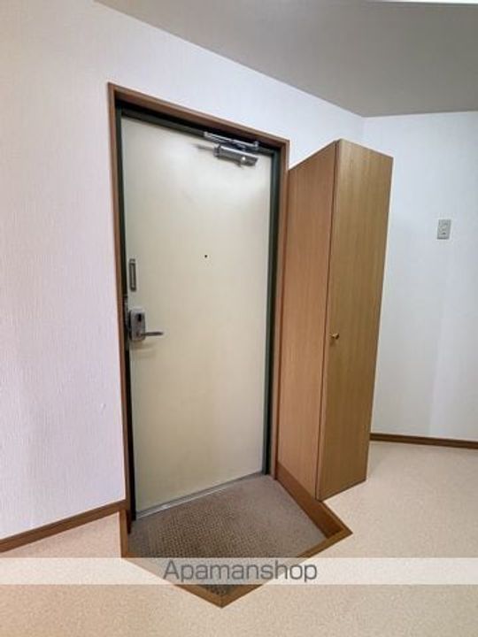 福島県郡山市朝日1丁目の賃貸マンションの玄関