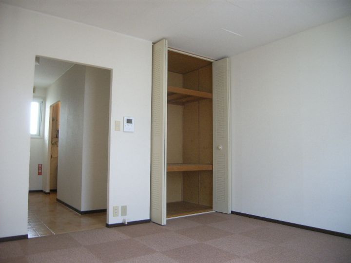 メゾンドミュゲ0201の居間