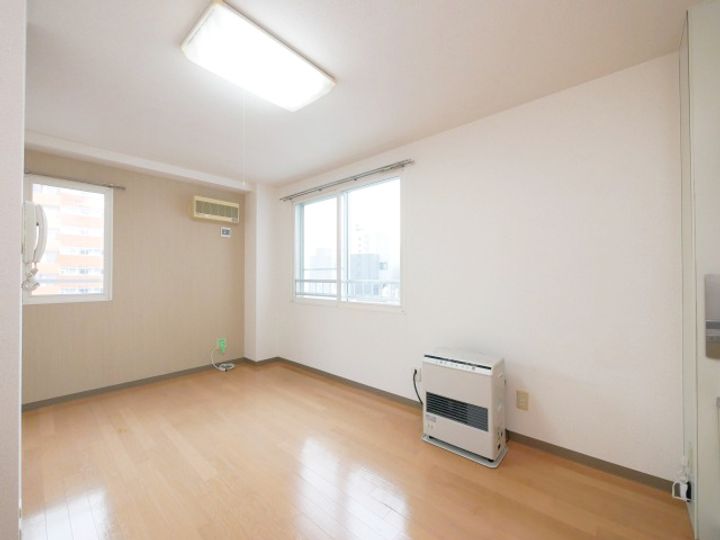 北海道札幌市白石区菊水一条1丁目の賃貸マンションの居間