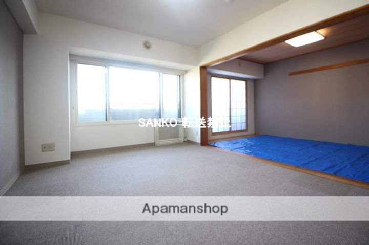 北海道札幌市北区北十九条西2丁目の賃貸マンションの居間