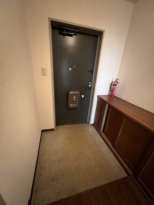 北海道札幌市北区北二十五条西16丁目の賃貸アパートの玄関