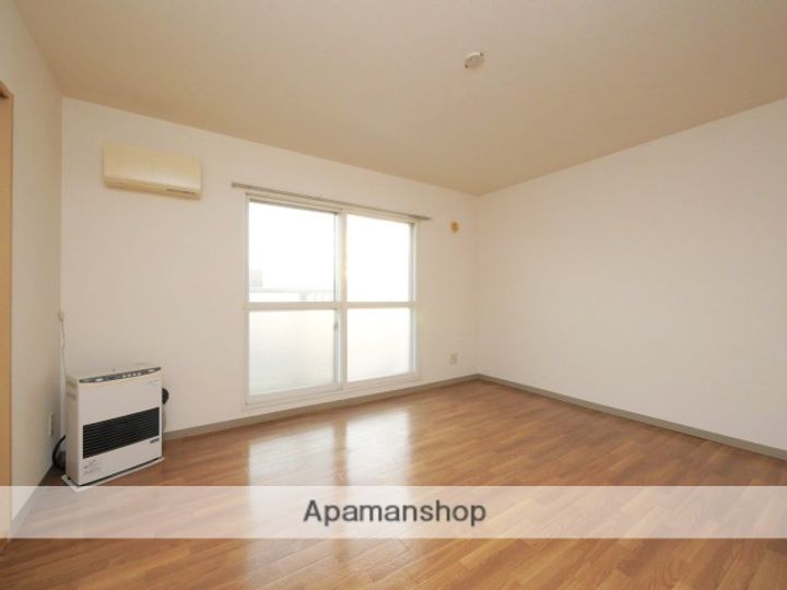 北海道札幌市北区百合が原4丁目の賃貸マンションの居間