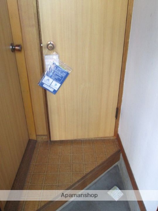 北海道札幌市北区新琴似十一条3丁目の賃貸アパートの玄関