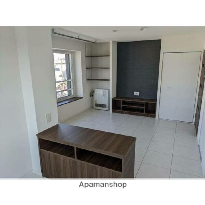 北海道札幌市北区北二十八条西15丁目の賃貸マンションの居間