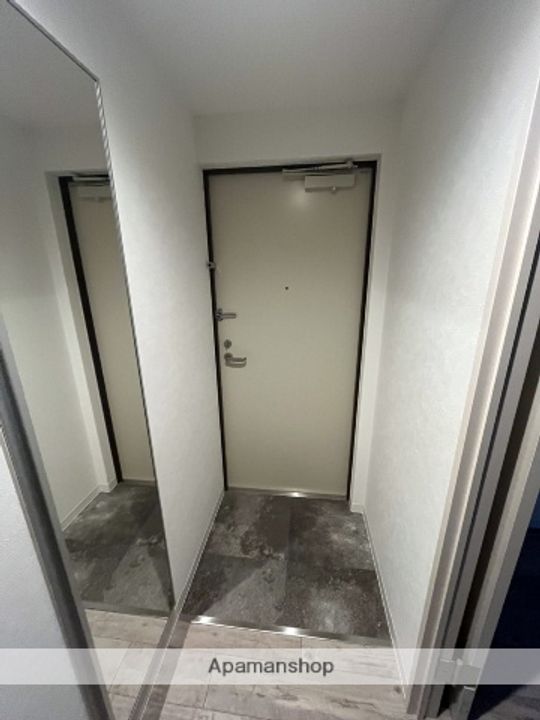 北海道札幌市北区北二十七条西2丁目の賃貸マンションの玄関