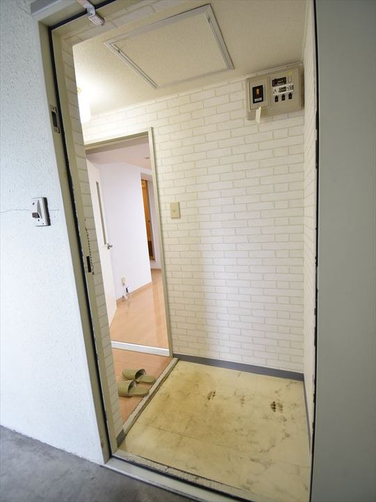 メゾン21202の玄関