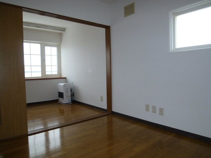 アーバンコート南郷Ⅰ203の居間