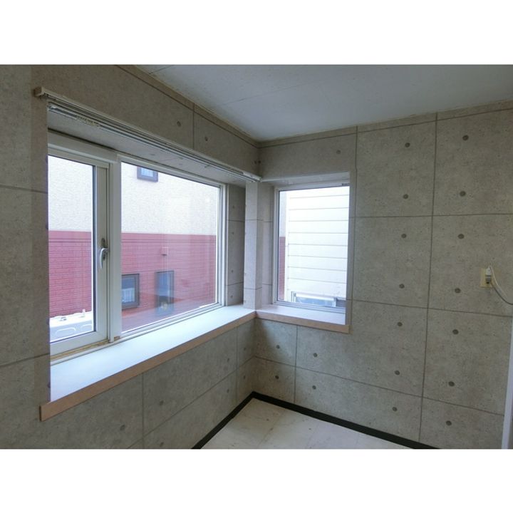 ベルノ真駒内107の居間