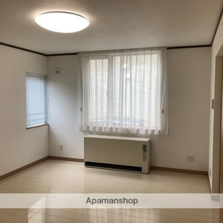 Sマンション松竹梅の居間