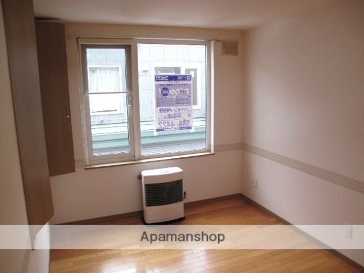 北海道札幌市手稲区手稲本町二条5丁目の賃貸アパートの居間