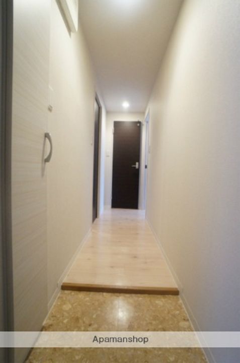 北海道札幌市手稲区手稲本町二条4丁目の賃貸マンションの玄関