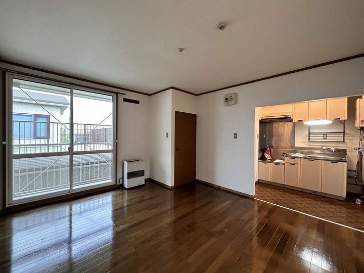 北海道札幌市手稲区富丘一条7丁目の賃貸アパート0202の居間