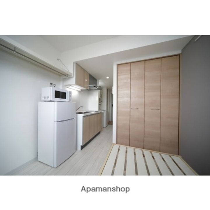 北海道札幌市手稲区前田六条16丁目の賃貸マンションの居間