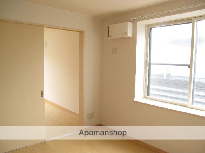 北海道札幌市手稲区富丘一条6丁目の賃貸アパートの居間