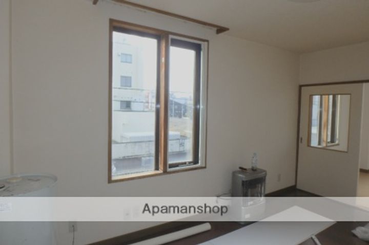 かねよし第2ビルマンションの居間