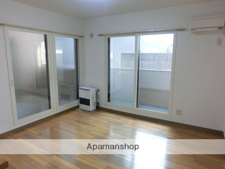 グラン・プラス山の手403の居間