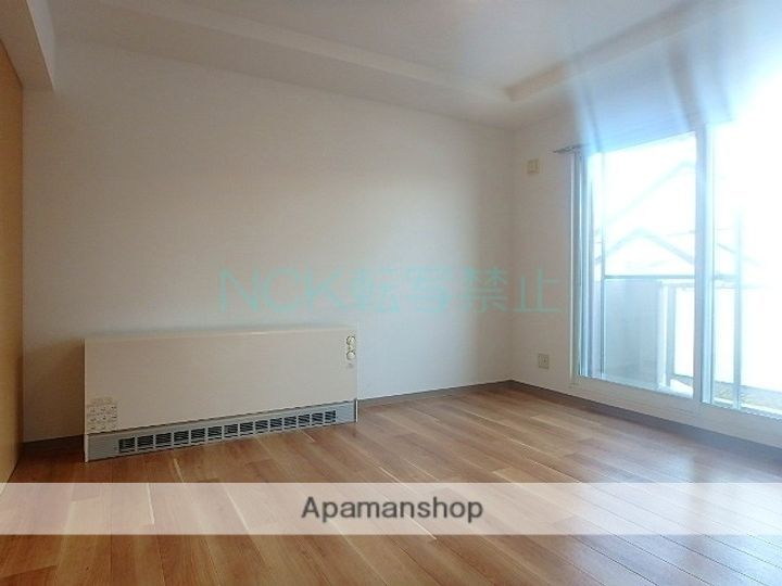 E・CORT伏古102の居間