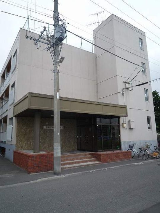 佐渡伏古マンション204の外観