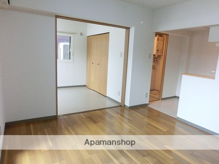 北海道札幌市西区山の手三条6丁目の賃貸マンションの居間